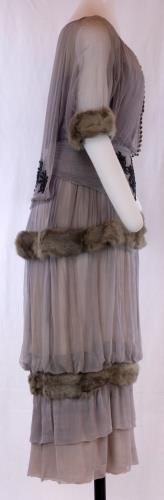 Side view of a purple fur hobble skirt from the 1910s