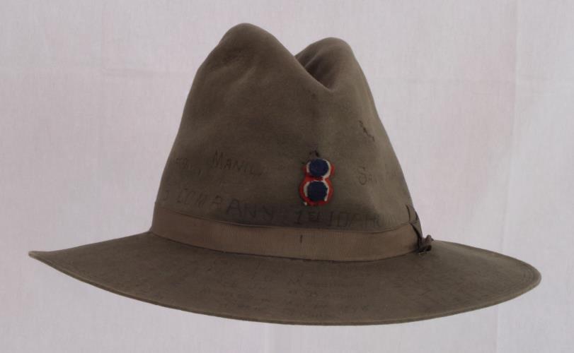 Front view of O.D. green fedora with crease, dent at top from the 1890s