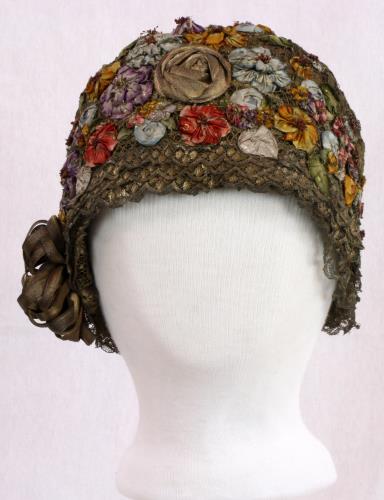 Front view of a metalic cloche from the 1920s