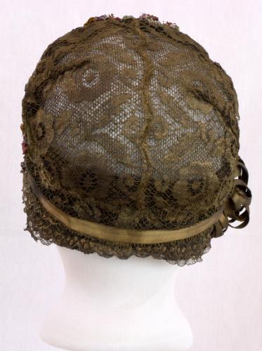 Back view of a metalic cloche from the 1920s