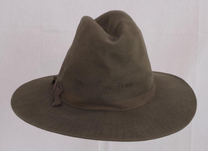 Back view of O.D. green fedora with crease, dent at top from the 1890s