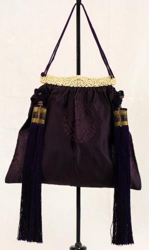 Deep purple silk like fabric purse from the 1900s