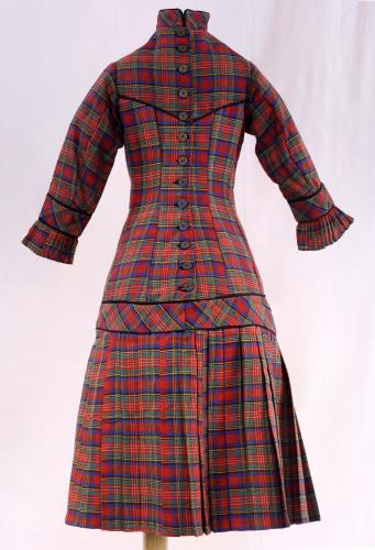 Back view of a plaid childs dress from the 1880s