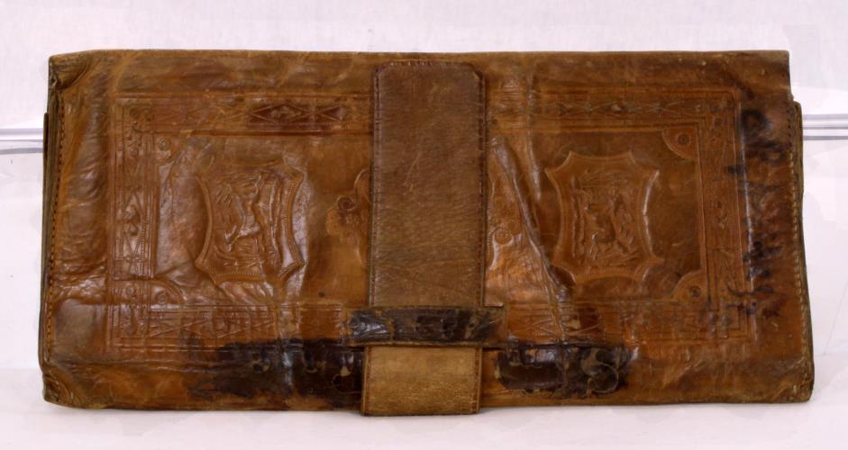 Back view (closed latch) of Riggs wallet from the 1900s