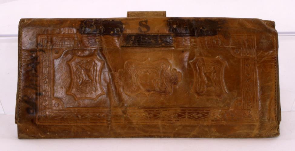 Back view (open latch) of Riggs wallet from the 1900s