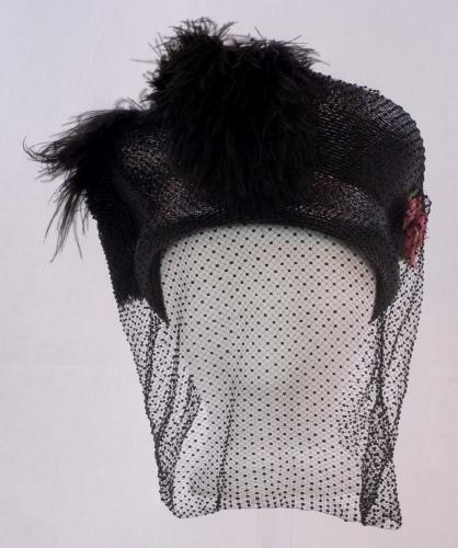Front view of a Toque with veil from the 1910s