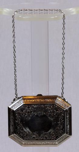 Front view of a sterling silver purse from the 1890s