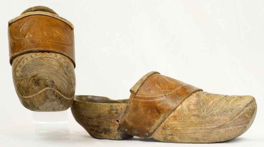 Front and side view of leather clogs from the 1900s