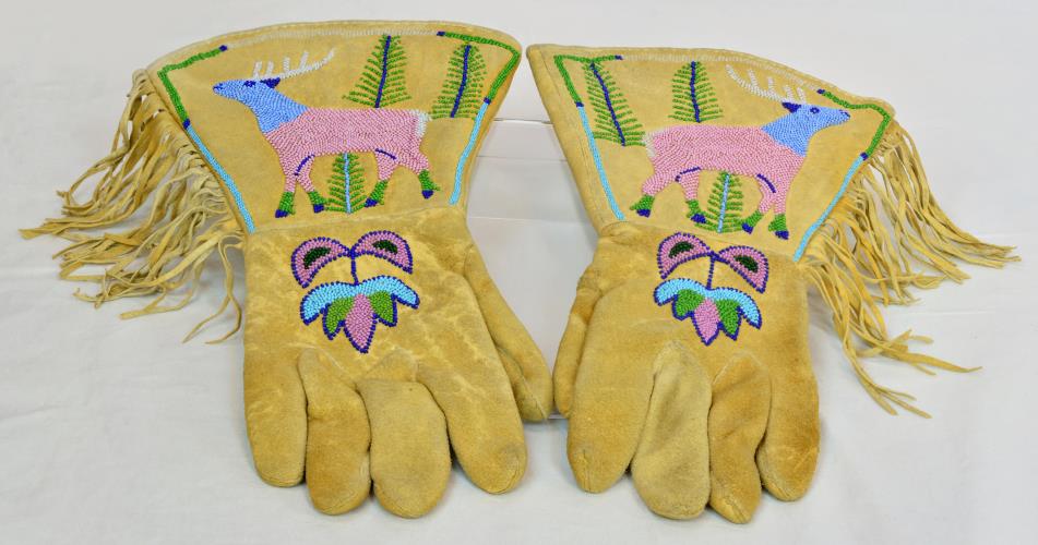 Pair of leather beaded gauntlets with deer design from the 1920s