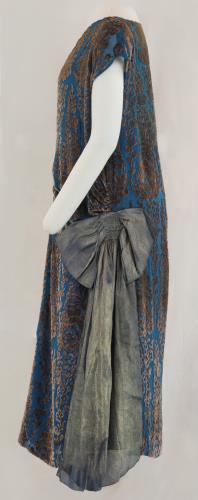 Left side view of a blue and taupe velvet gown from the 1920s