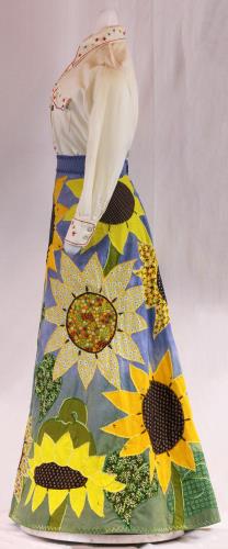 Left side view of a sunflower dress, circa 1970.