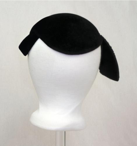 Back view of a black velvet hat with pink sequens, circa 1950.