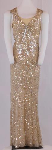 Front view of a floor length, sleeveless, sequined peach silk chiffon, circa 1930.