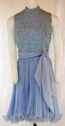 Front view of a blue beaded dress from the 1960s