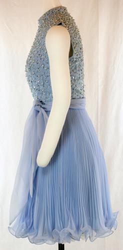 Side view of a blue beaded dress from the 1960s